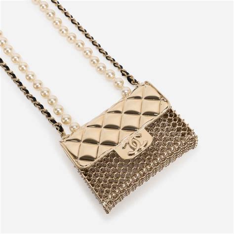 chanel timeless micro necklace|Chanel pendant necklace.